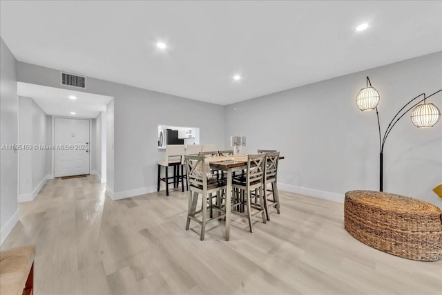 dining area featuring light hardwood / wood-style floors