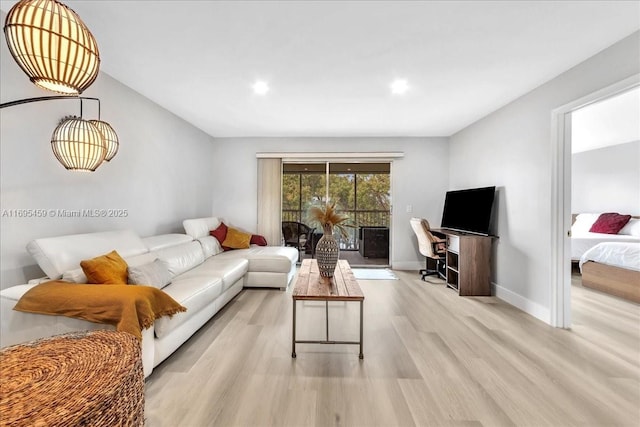 living room featuring light wood-type flooring