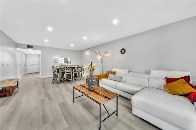 living room featuring light wood-type flooring