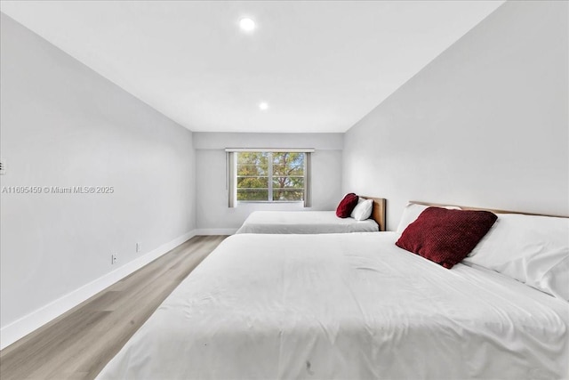 bedroom featuring light wood-type flooring