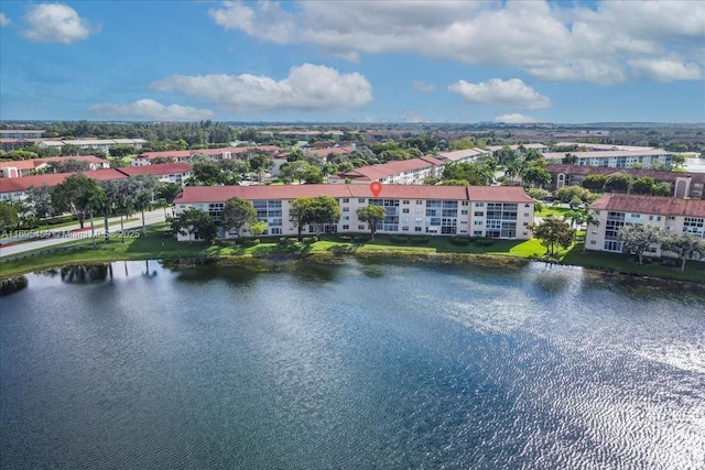 bird's eye view with a water view