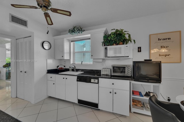 kitchen featuring white cabinetry, white appliances, sink, and light tile patterned floors