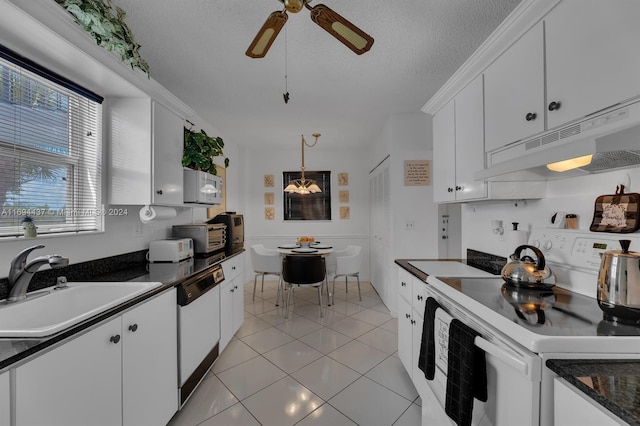 kitchen with electric stove, dishwashing machine, white cabinets, and a textured ceiling