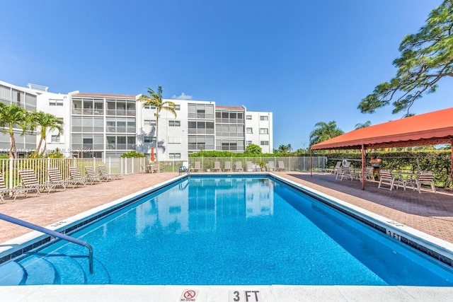 view of swimming pool with a patio area