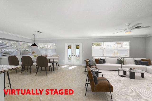 living room with ceiling fan, french doors, light tile patterned flooring, and ornamental molding