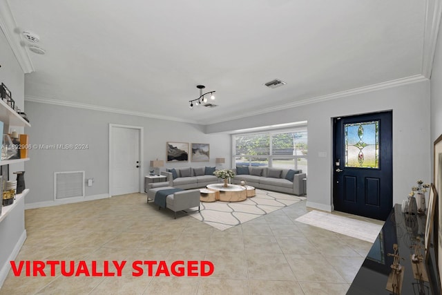 living room featuring light tile patterned floors, a notable chandelier, and ornamental molding