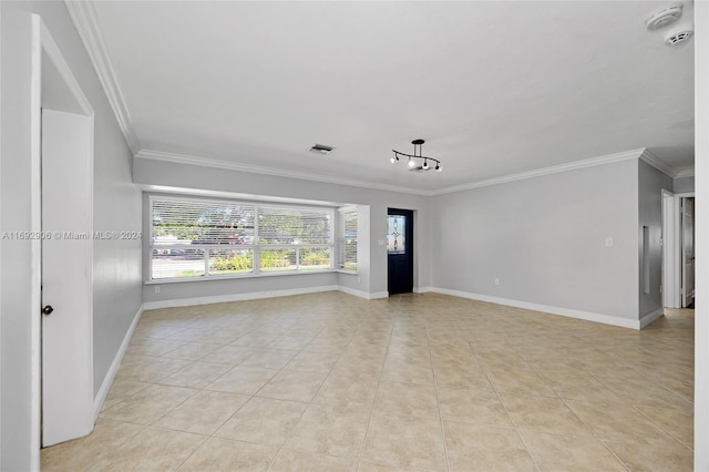 unfurnished living room with light tile patterned flooring, ornamental molding, and an inviting chandelier