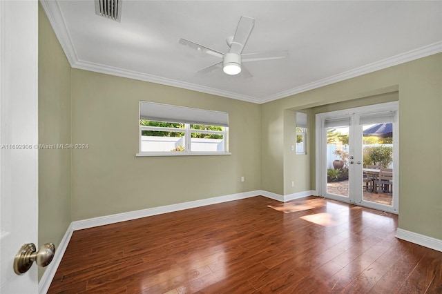 unfurnished room with hardwood / wood-style floors, french doors, and a wealth of natural light