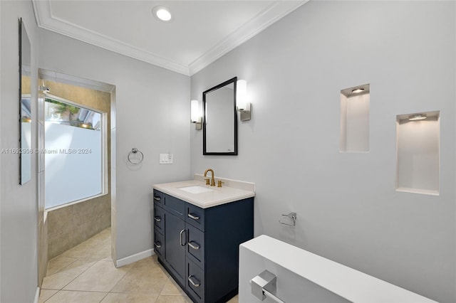 bathroom featuring vanity, tile patterned floors, and ornamental molding