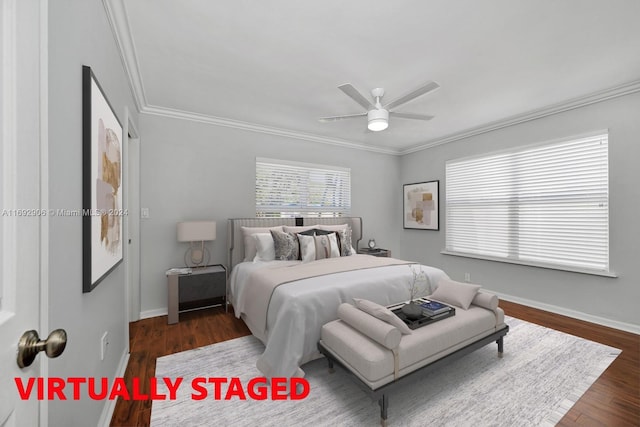 bedroom featuring ceiling fan, crown molding, and dark wood-type flooring