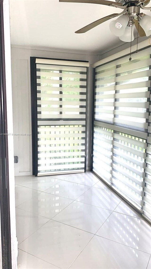 spare room featuring light tile patterned floors