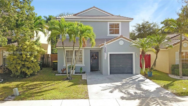 mediterranean / spanish house with a front yard