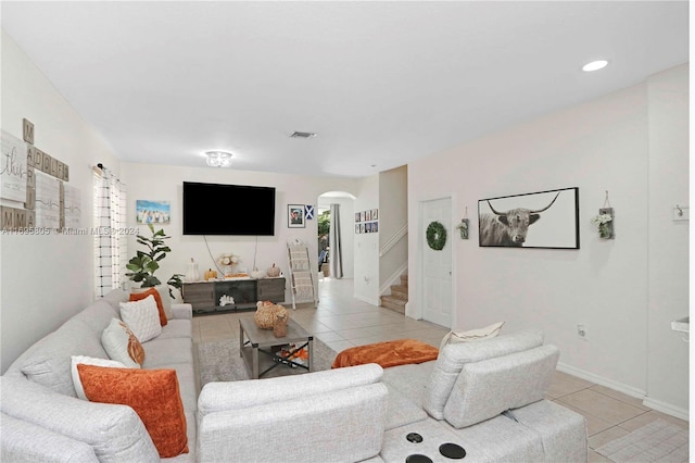 living room featuring light tile patterned floors