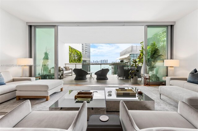 1300 Monad Ter Unit 8D, Miami Beach, FL 33139 - living room with floor to ceiling windows and a wealth of natural light