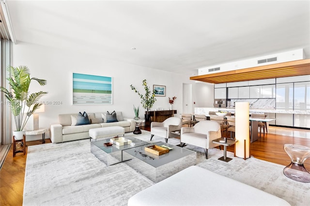 living room with hardwood / wood-style flooring