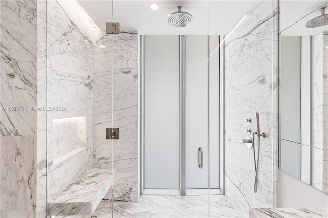 bathroom featuring an enclosed shower