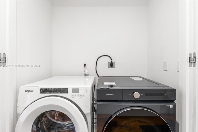 laundry area featuring washing machine and dryer