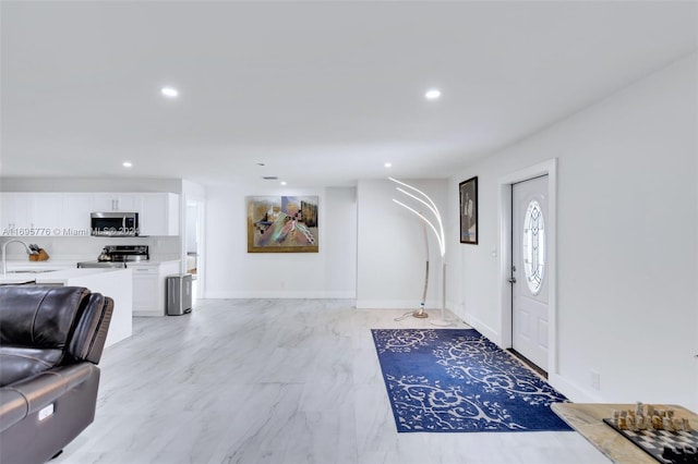 entrance foyer featuring sink