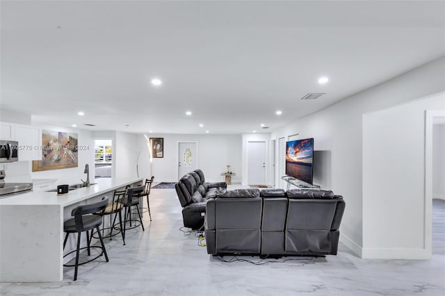 living room with sink