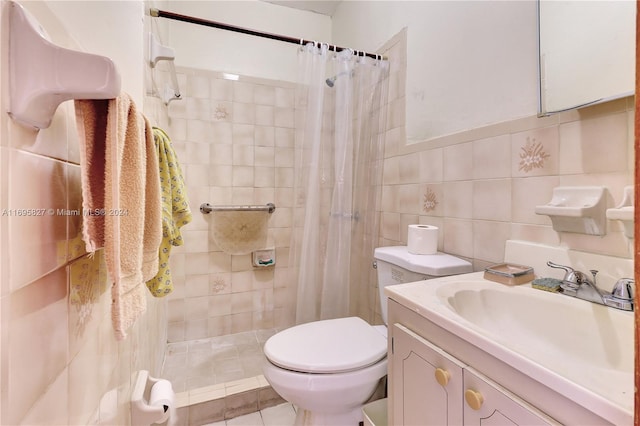 bathroom featuring tile patterned flooring, toilet, vanity, tile walls, and a shower with shower curtain