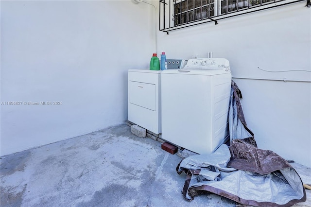 laundry room featuring washing machine and dryer