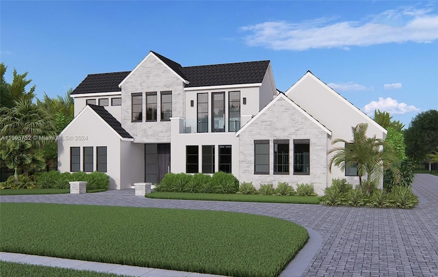 16684 SW 59th Ct, Southwest Ranches, FL 33331 - view of front of house featuring a front yard, stucco siding, and a tile roof