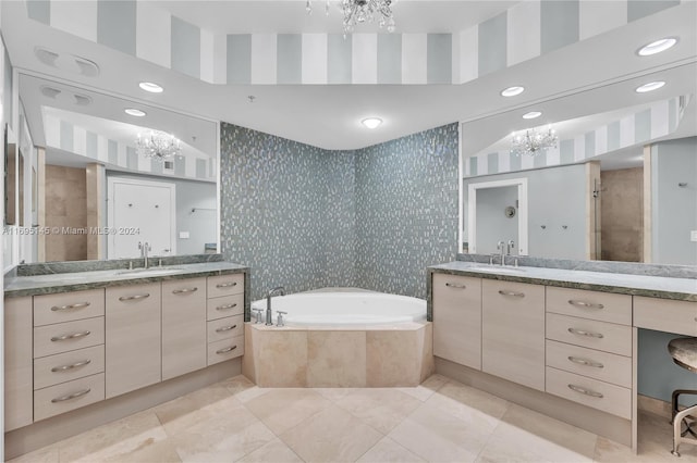 bathroom with tile patterned flooring, vanity, and independent shower and bath