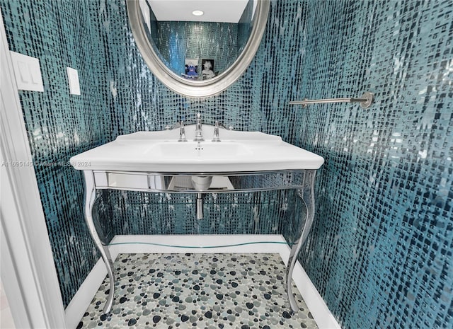 bathroom with tile patterned floors