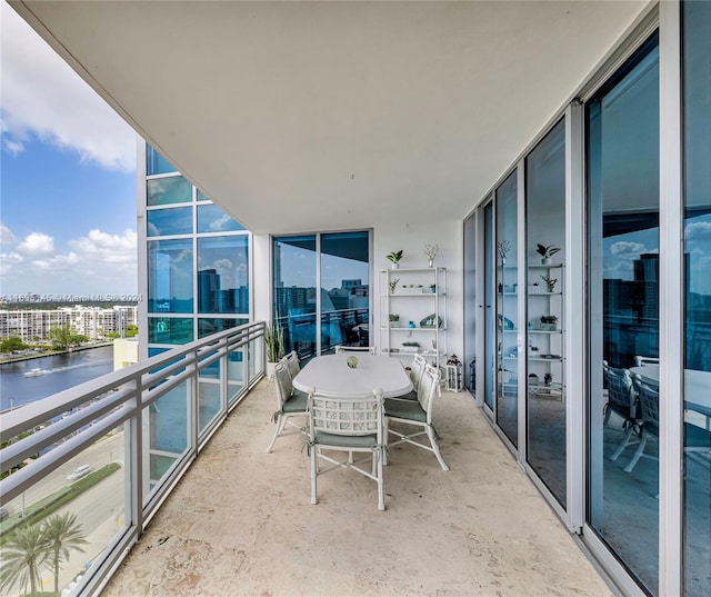 balcony featuring a water view