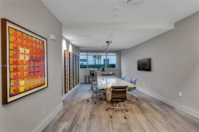 dining room with light hardwood / wood-style flooring