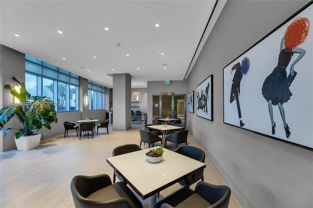 dining space with light hardwood / wood-style floors