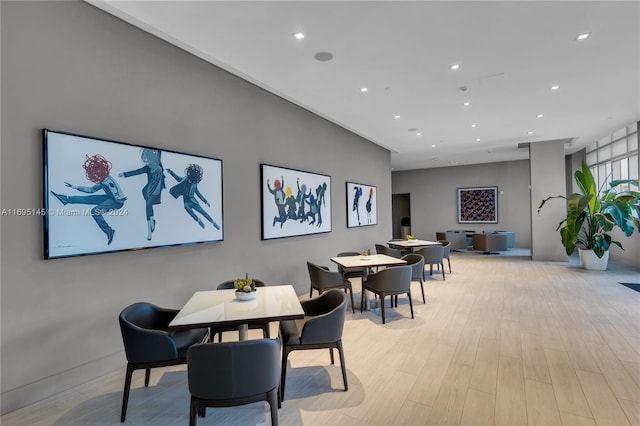 dining space featuring light hardwood / wood-style floors