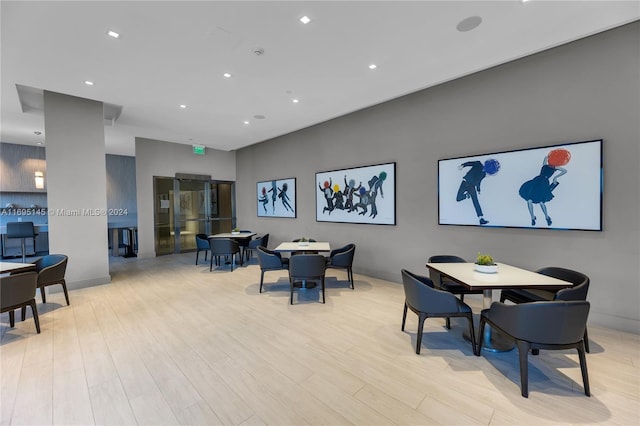 dining space featuring light hardwood / wood-style flooring