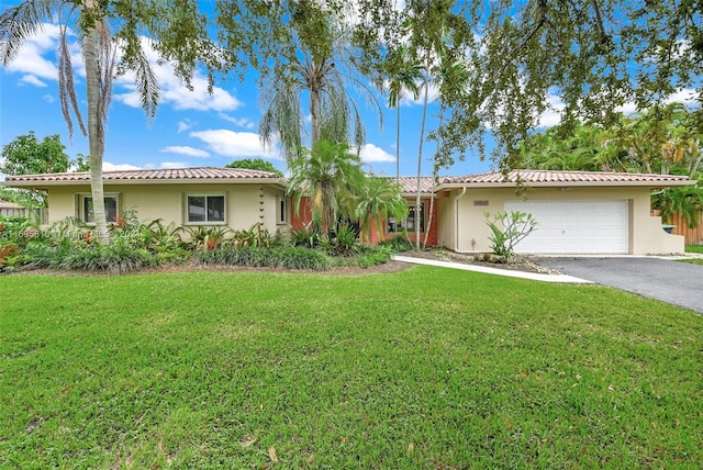 ranch-style house with a front lawn and a garage