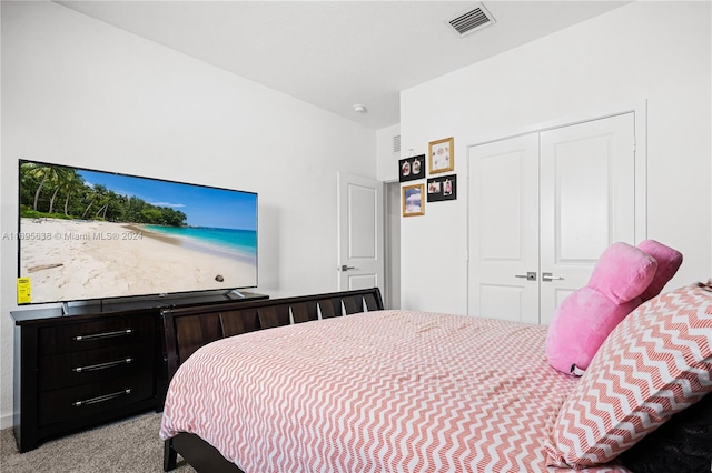 bedroom featuring light carpet