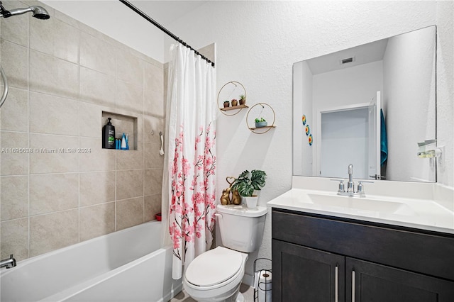 full bathroom featuring vanity, toilet, and shower / tub combo with curtain