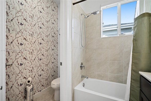 full bathroom featuring tile patterned floors, vanity, toilet, and shower / bath combo with shower curtain