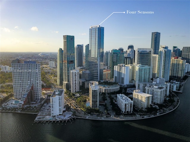 property's view of city featuring a water view