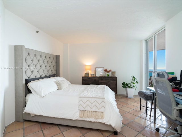 bedroom with light tile patterned flooring