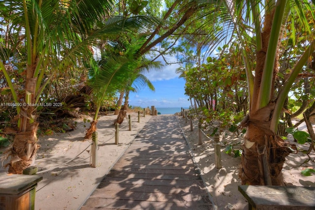 surrounding community featuring a water view