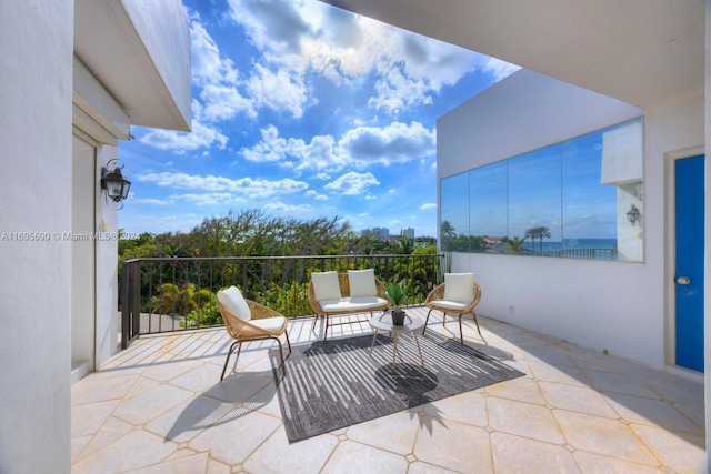 view of patio with a balcony