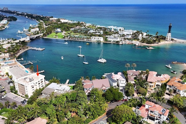 birds eye view of property featuring a water view