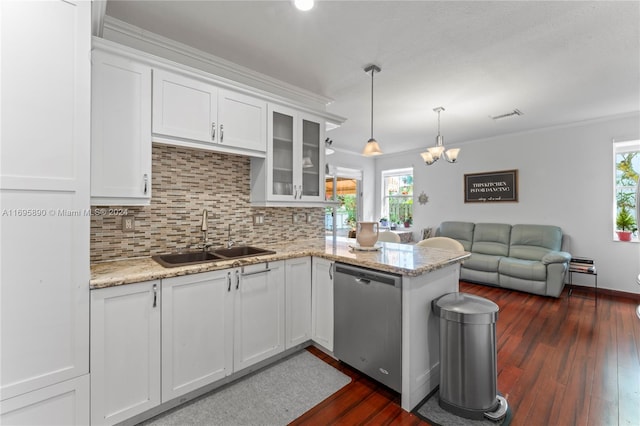 kitchen with dishwasher, white cabinets, a wealth of natural light, and sink