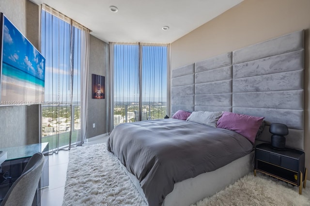 tiled bedroom featuring access to exterior