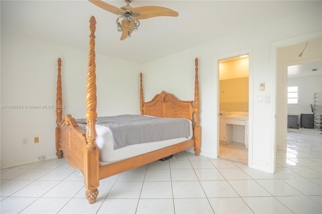 tiled bedroom with connected bathroom and ceiling fan