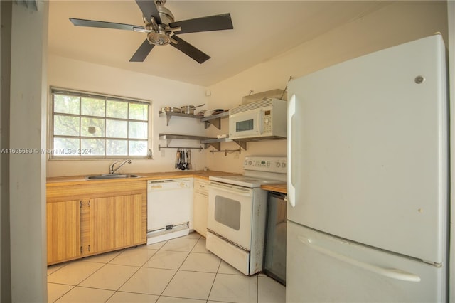 kitchen featuring ceiling fan, sink, light tile patterned floors, and white appliances