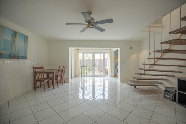 interior space featuring french doors and ceiling fan