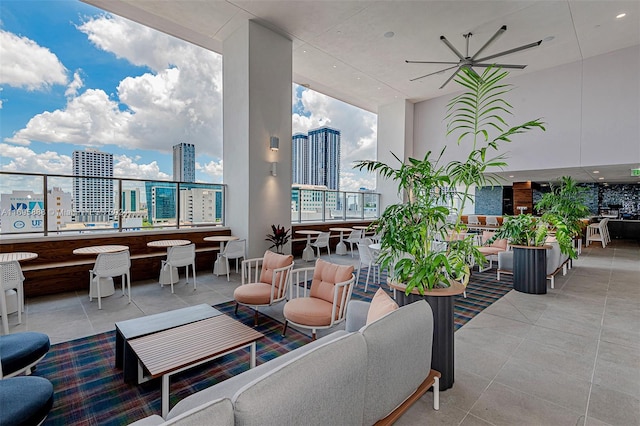 view of patio / terrace featuring ceiling fan and an outdoor living space