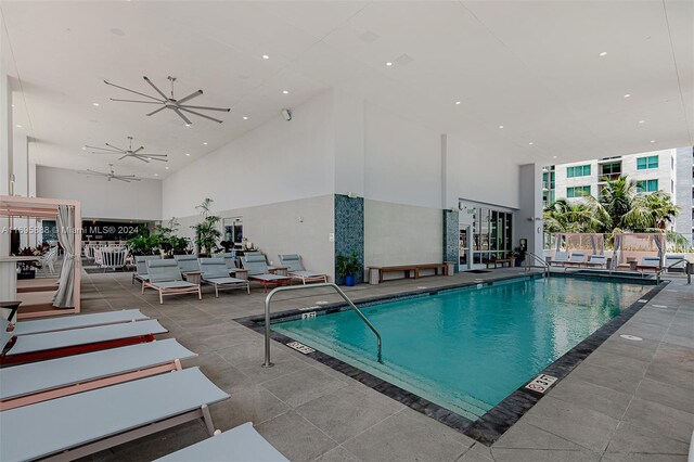 view of pool featuring ceiling fan