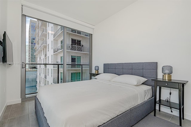 bedroom featuring light tile patterned flooring